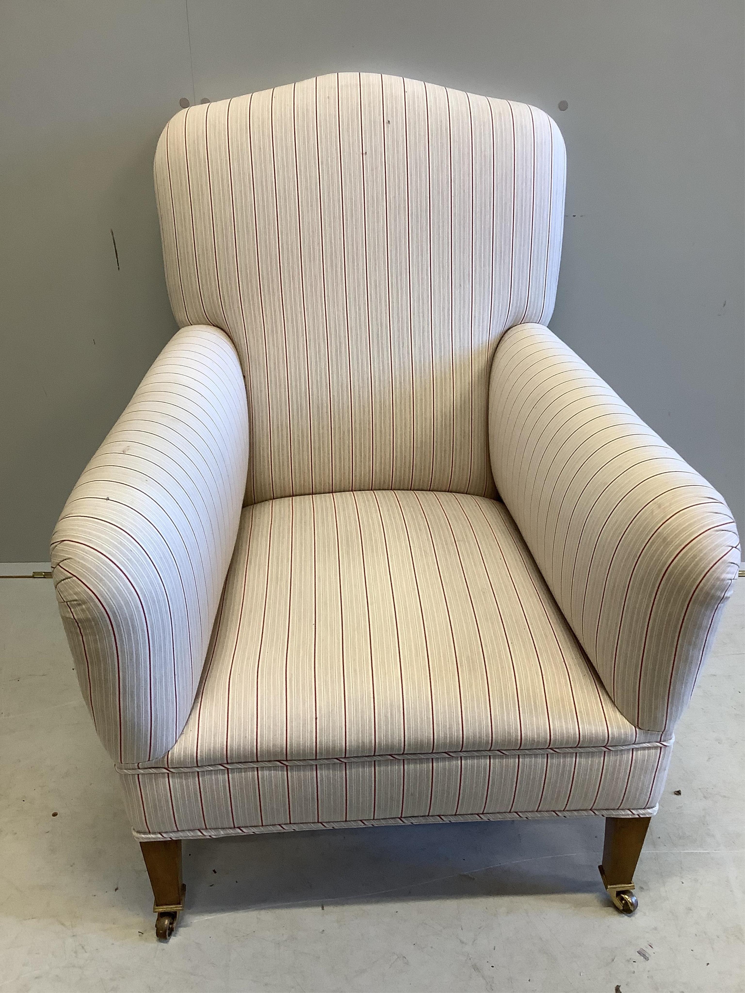 An Edwardian upholstered armchair, width 69cm, depth 75cm, height 90cm. Condition - good